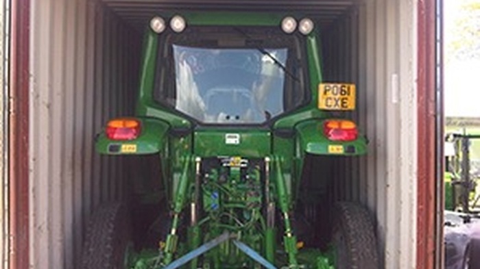 Agricultural and industrial vehicle shipping from the UK to Asia using container freight transport